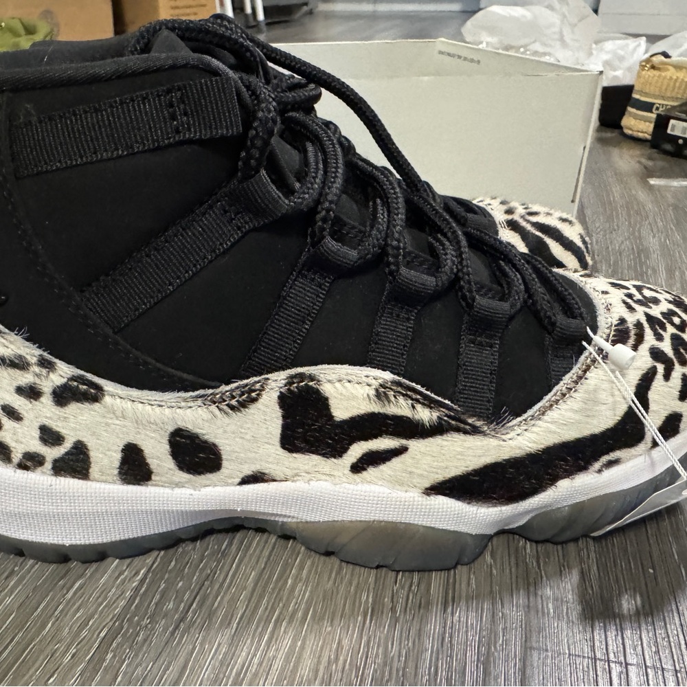 Nike Air Jordan 11 Black and Animal Instinct Women's Sneakers